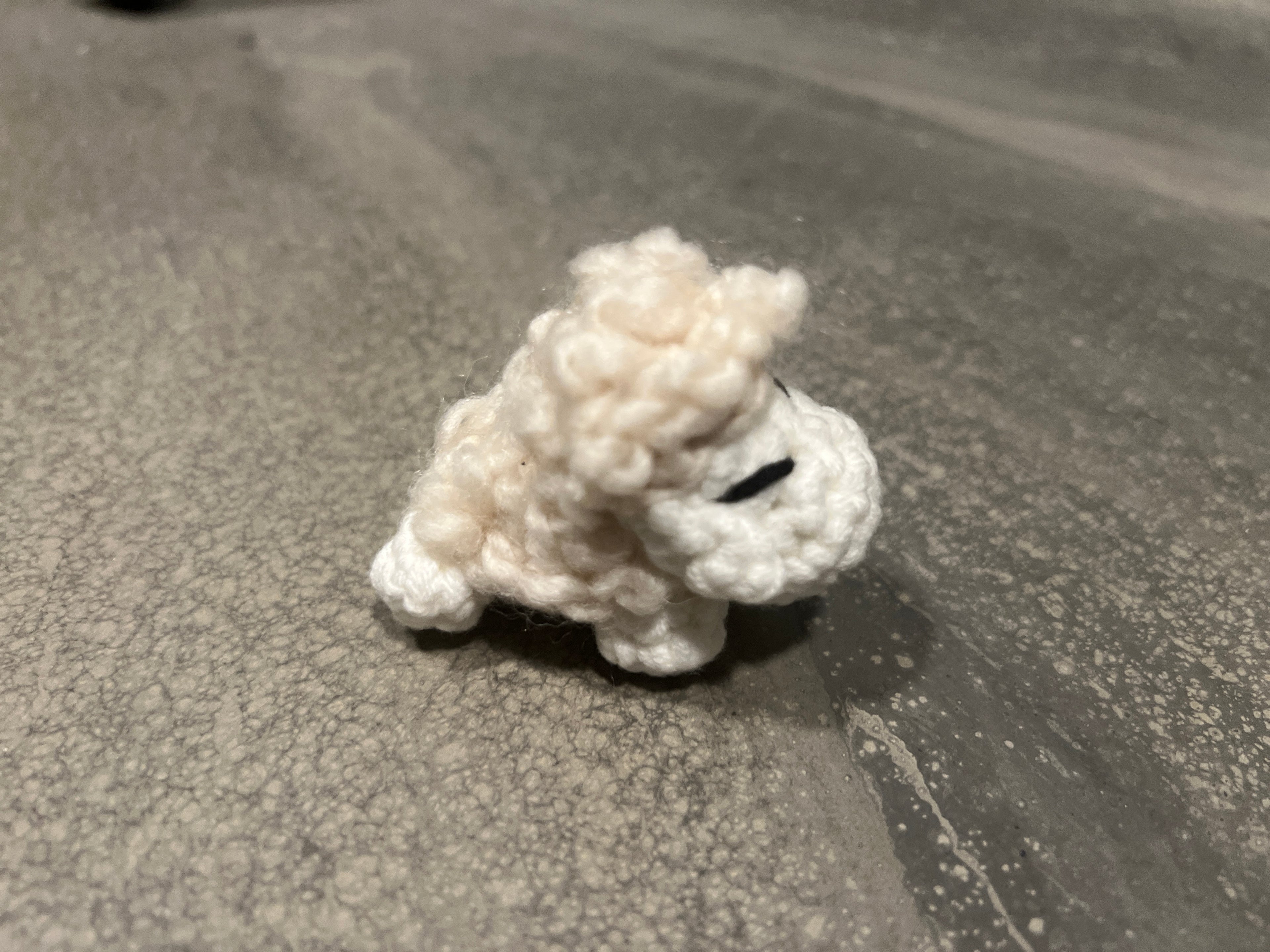 Side view of handmade mini sheep figurine - perfect keychain charm or desk decoration
