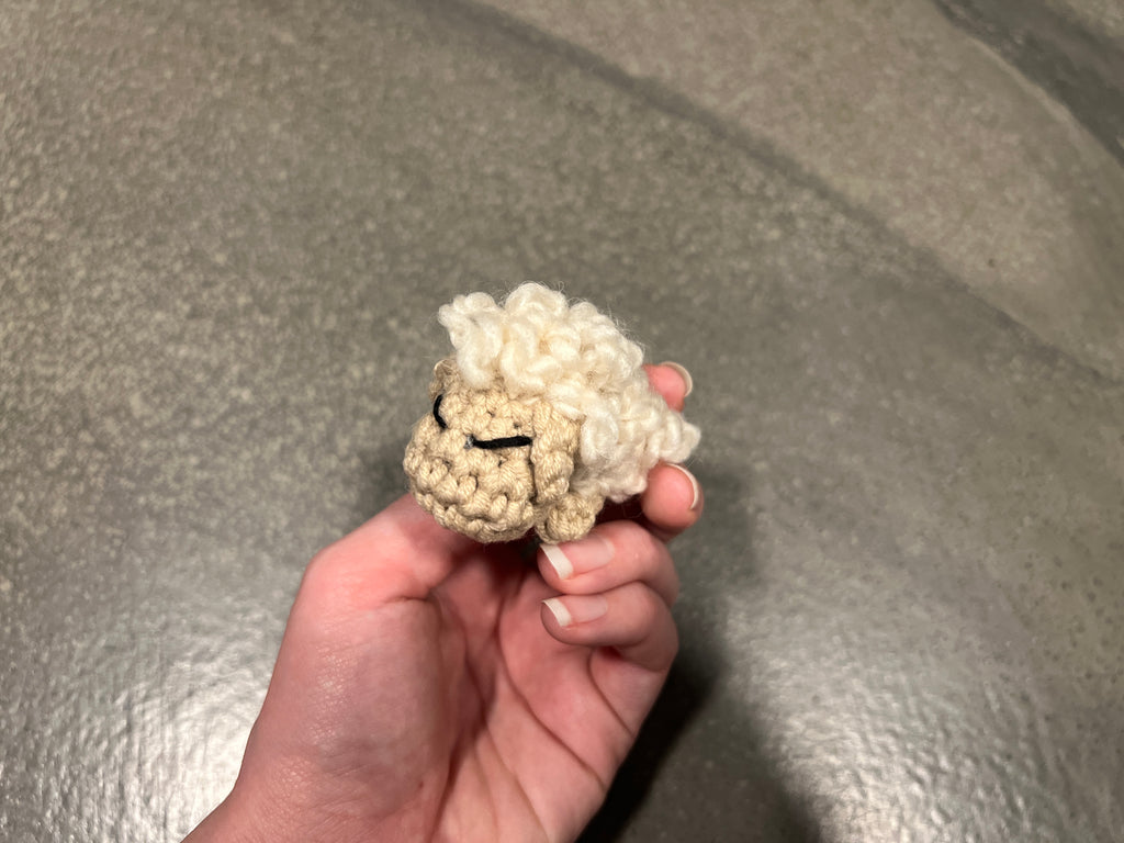 Side view of handmade mini sheep figurine - perfect keychain charm or desk decoration
